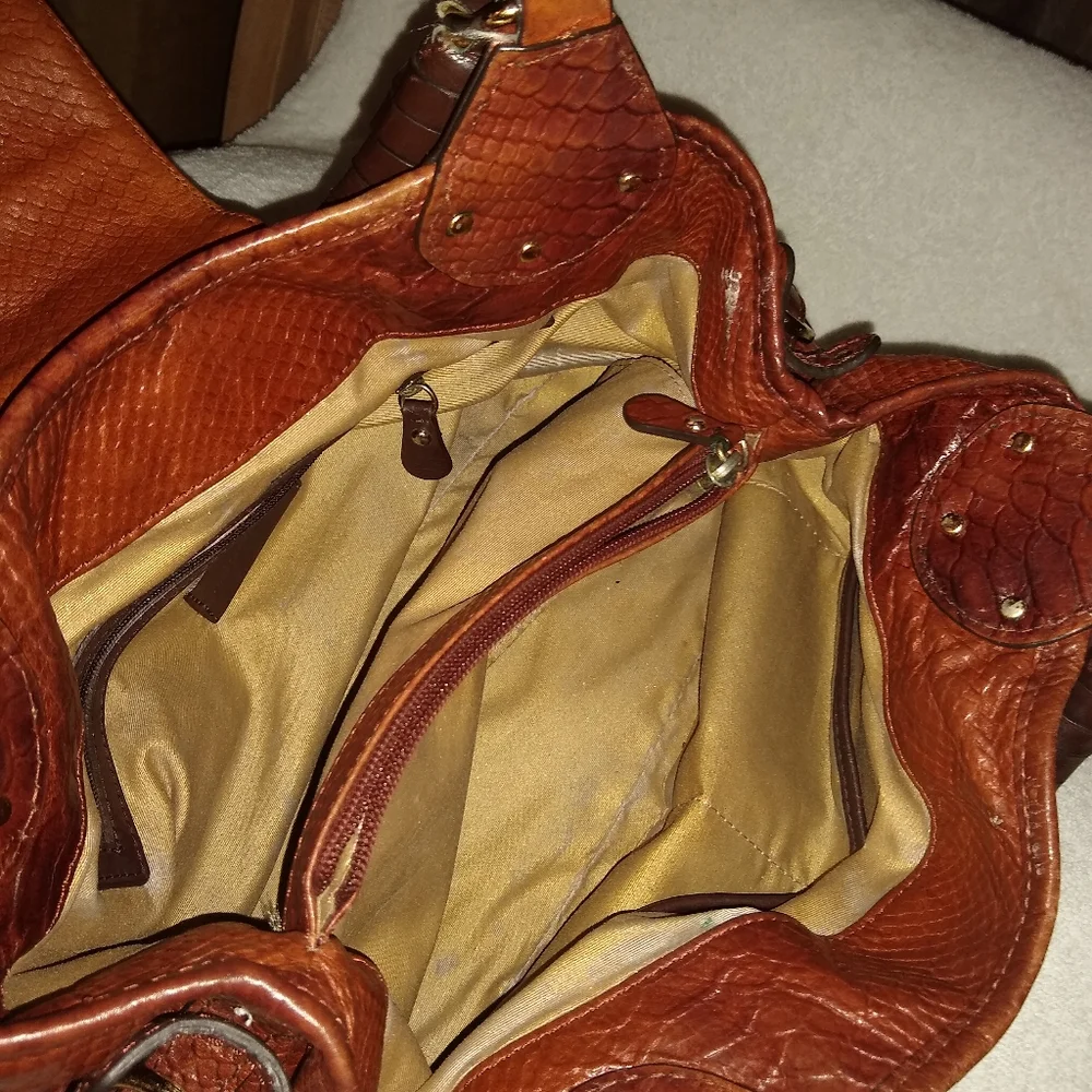 Antonio Melani brown croc embossed hobo leather bag.